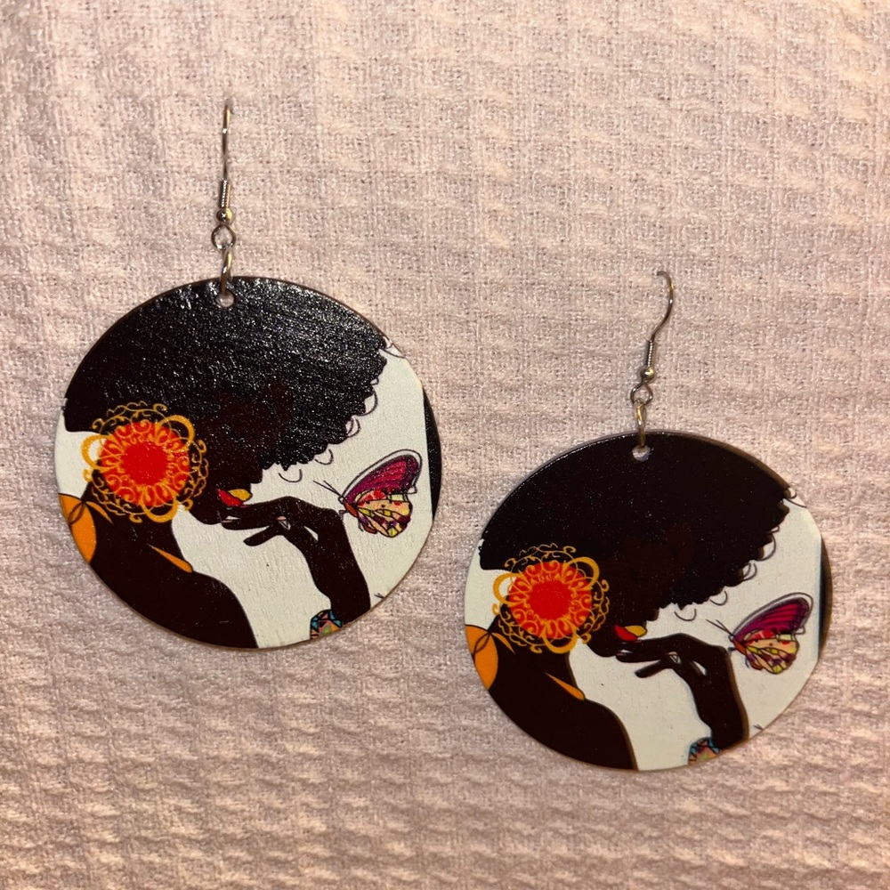 Chic Silhouette Earrings with Butterfly Accent